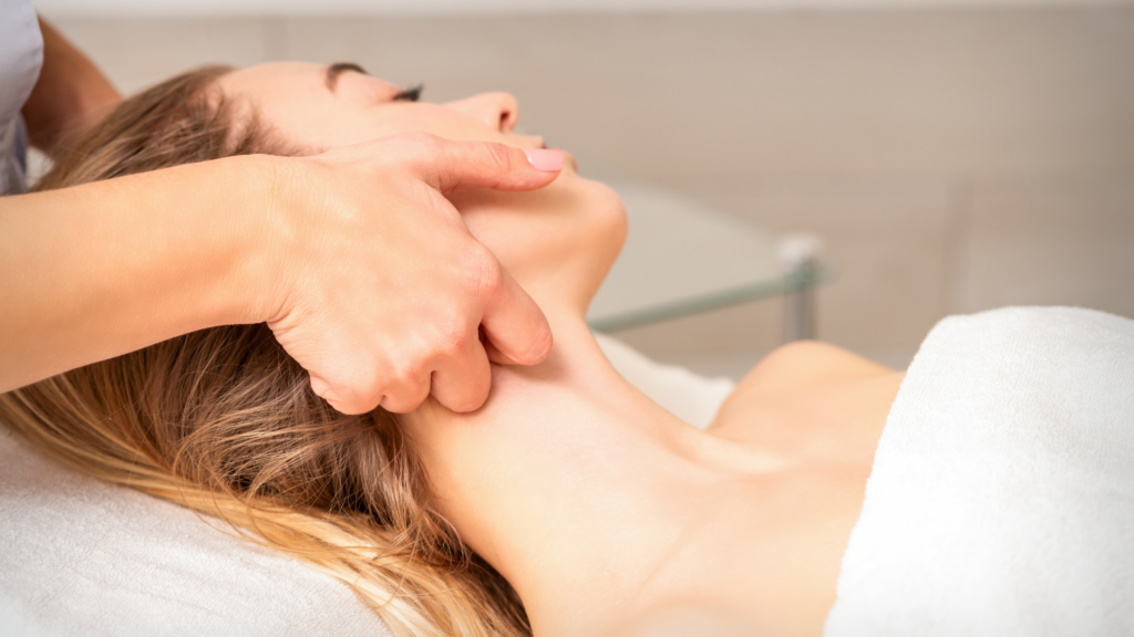 Woman receiving lymphatic drainage massage