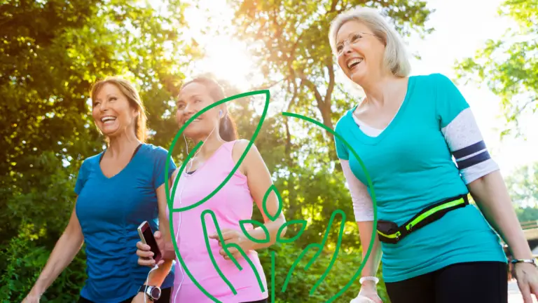3 older women enjoying a walk outside under the sun